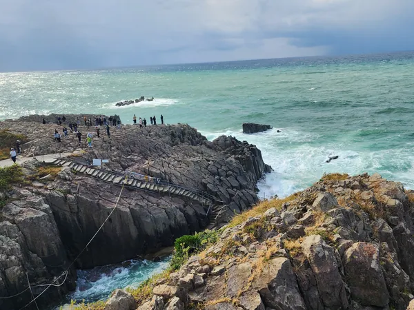 Tojinbo viewpoint terrace with stairs and sea cliffs